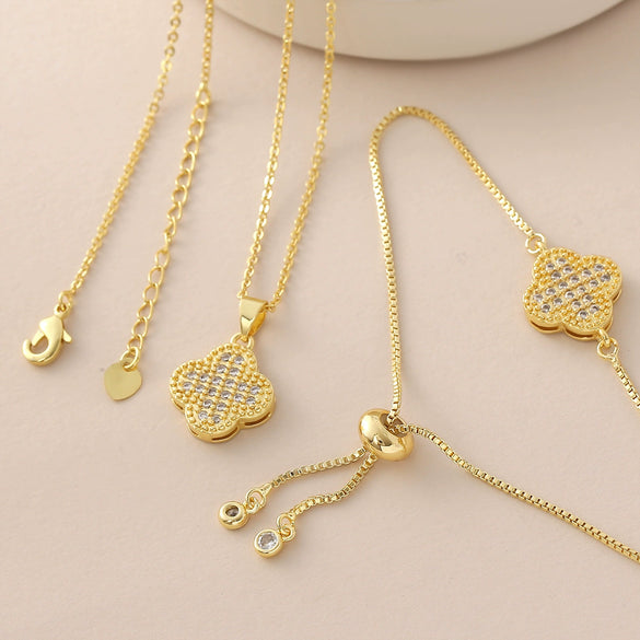 Wholesale Copper Goldplated Fourleaf Clover Pendant Necklace And Bracelet Set Jewelry For Women With Plants And Flowers Pattern And O Word Chain