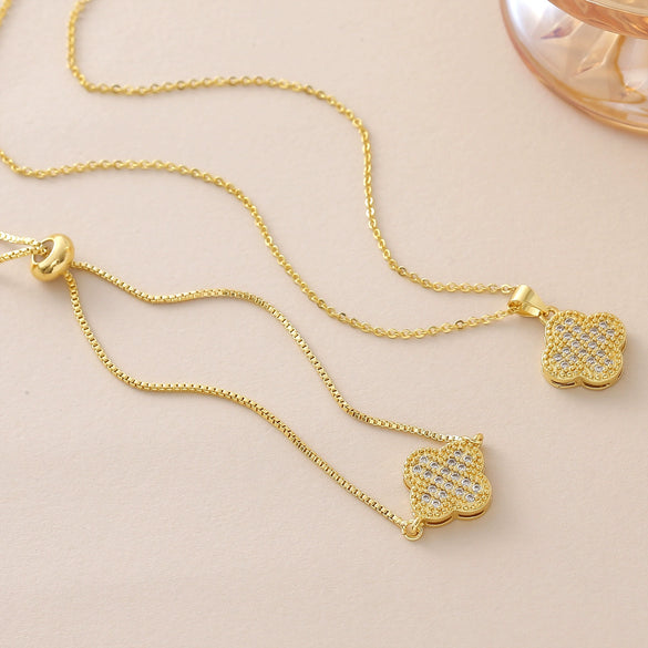 Wholesale Copper Goldplated Fourleaf Clover Pendant Necklace And Bracelet Set Jewelry For Women With Plants And Flowers Pattern And O Word Chain