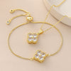 Wholesale Copper Goldplated Fourleaf Clover Pendant Necklace And Bracelet Set Jewelry For Women With Plants And Flowers Pattern And O Word Chain