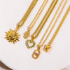 Wholesale Copper Hamsa Hand Love Heart Diamond Butterfly Tooth Big Sun Pendant Zircon Necklace With Geometric Pattern And Diamond Treatment