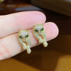 Wholesale Copper Inlaid Zircon Animal Hiphop Cheetah Leopard Head Lying Down Electroplated Earrings For Men