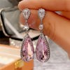Wholesale Copper Inlaid Zircon Heartshaped Girls Earrings With Geometric Design