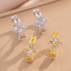 Wholesale Copper 18K Real Gold Plated Micropaved Zircon Fourleaf Clover Light Luxury Earrings