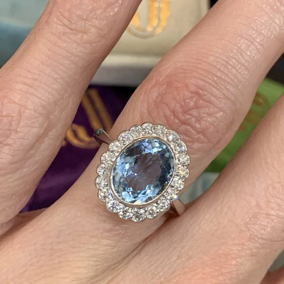 Wholesale Copper Ladies Ring Inlaid With Oval Zircon And Flower Pattern