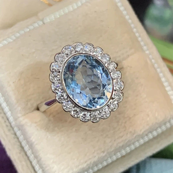 Wholesale Copper Ladies Ring Inlaid With Oval Zircon And Flower Pattern