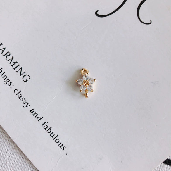 Wholesale Copper Plated Real Gold Hollow Flower Zircon Earrings Jewelry Accessories