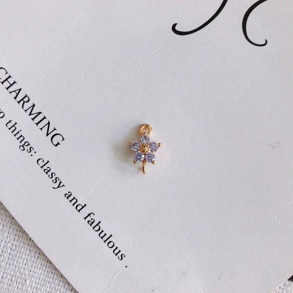 Wholesale Copper Plated Real Gold Hollow Flower Zircon Earrings Jewelry Accessories