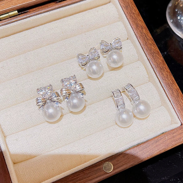 Wholesale Copper 925 Silver Needle Zircon And Pearl Earrings With Sweet Bow Design For Women