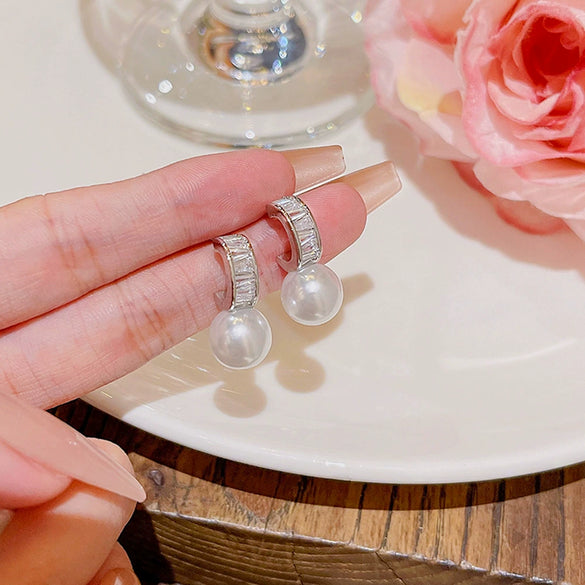 Wholesale Copper 925 Silver Needle Zircon And Pearl Earrings With Sweet Bow Design For Women