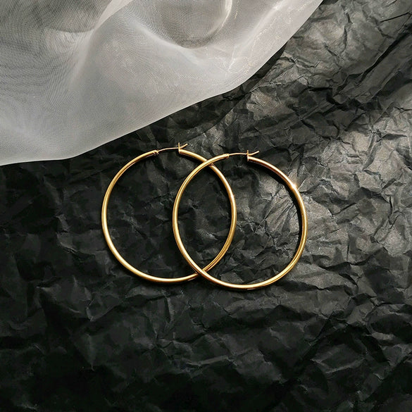 Wholesale Copper Simple Geometric Round Hollow Earrings For Women With Real Gold Plating