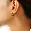 Wholesale Ear Jewelry French Retro Green Glass Hollow Titanium Steel Plated 18K True Gold Niche Geometric Earrings