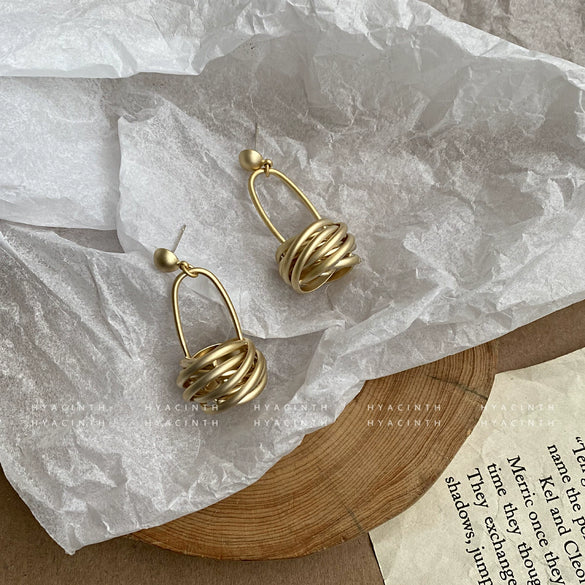 Wholesale Earrings Copper Alloy Geometric Matte Circle Knotted Hanging Basket Non Pierced Screw Clip
