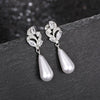 Wholesale Earrings Copper Imitation Pearl Dropshaped Flower Geometric Simple Style Women's