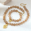 Wholesale Electroplated Stainless Steel And Titanium Steel Heart Beaded Sweater Chain Necklace For Women In Minimalist Ocean Series Style