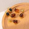 Wholesale Elegant Amber Titanium Steel Geometric Earrings Plated With 18K Gold