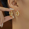 Wholesale Elegant Geometric Twist Circle Copper Zircon Earrings For Women