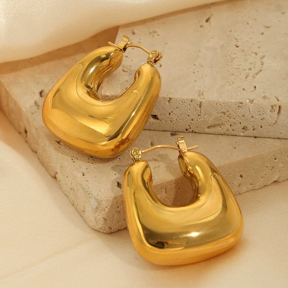 Wholesale Elegant Golden Hollow Small Lucky Bag Earrings In Titanium Steel With Geometric U Shaped Pattern And Electroplating Treatment For Women