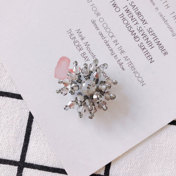 Wholesale Exaggerated Flower Handmade Beaded Alloy Ear Clip Woven Transparent Crystal Snowflake Earrings