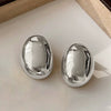 Wholesale Exaggerated Geometric Oval Copper Earrings For Women With Electroplating Design