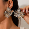 Wholesale Exaggerated Metal Flower Earrings With Electroplating