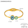Wholesale Fashion Blue Eye Pattern Round Titanium Steel Goldplated Spring Bracelet Jewelry
