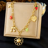 Wholesale Fashion Creative Multielement Stainless Steel Flower Pendant O Word Chain Necklace With Electroplating