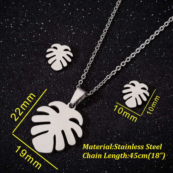 Wholesale Fashion Geometric Flying Deer Snowflake Feather Hollow Skull Stainless Steel Earrings Necklace With Electroplating For Women