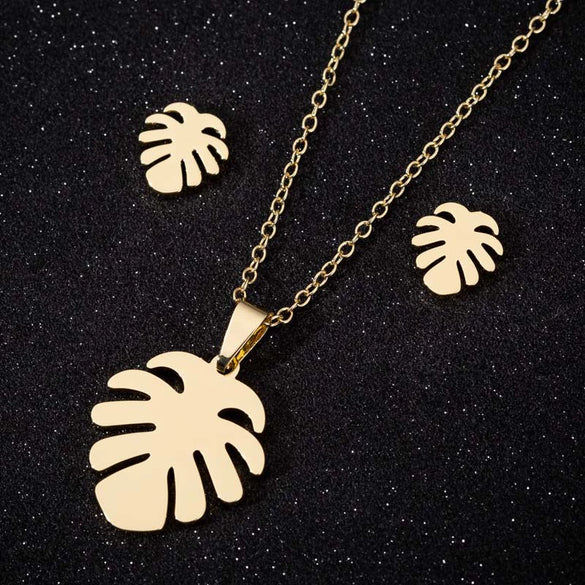 Wholesale Fashion Geometric Flying Deer Snowflake Feather Hollow Skull Stainless Steel Earrings Necklace With Electroplating For Women