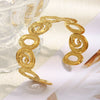 Wholesale Fashion Geometric Spiral Cut Out Design Oil Pressure 18K Gold Plated Stainless Steel Hand Bracelet