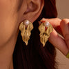 Wholesale Fashion High Sense Inlaid Imitation Pearl Stainless Steel Women's Geometric And Flower Pattern Earrings With Electroplating