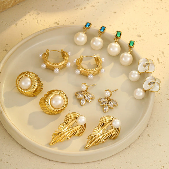 Wholesale Fashion High Sense Inlaid Imitation Pearl Stainless Steel Women's Geometric And Flower Pattern Earrings With Electroplating