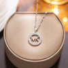 Wholesale Fashion Simple Hollow Round Letter Inlaid Zircon Lovers Necklace Made Of Titanium Steel With Electroplating Treatment