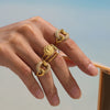 Wholesale Fashion Women's Electroplated Stainless Steel Geometric Abstract Smiling Face Sun And Cactus Inlaid Zircon Ring