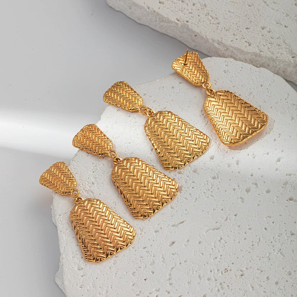Wholesale Fashion Women's Stainless Steel Banana Fan Earrings With Embossed Leaves Design And Electroplating Treatment