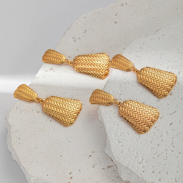 Wholesale Fashion Women's Stainless Steel Banana Fan Earrings With Embossed Leaves Design And Electroplating Treatment