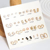 Wholesale Fashionable Geometric Zinc Alloy Electroplated Mini Diamond Cut Out And Pearl Cherry Pendant Earrings For Women