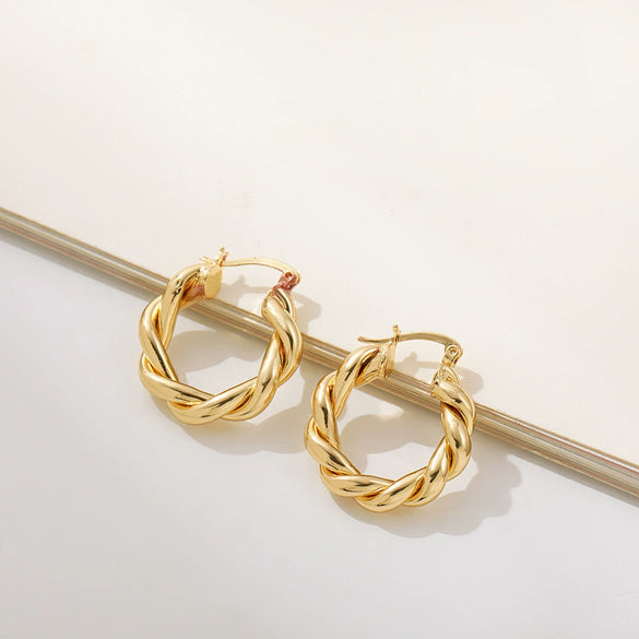 Wholesale Female Alloy Circle Earrings With Twisted Design And Geometric Pattern Electroplated