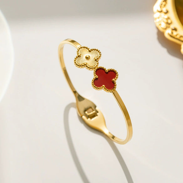 Wholesale Female Fashion Fourleaf Flower Titanium Steel Open Bracelet With Polishing Treatment And Nonfading Feature