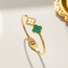 Wholesale Female Fashion Fourleaf Flower Titanium Steel Open Bracelet With Polishing Treatment And Nonfading Feature