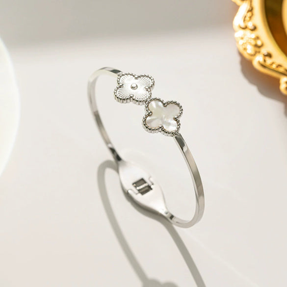 Wholesale Female Fashion Fourleaf Flower Titanium Steel Open Bracelet With Polishing Treatment And Nonfading Feature