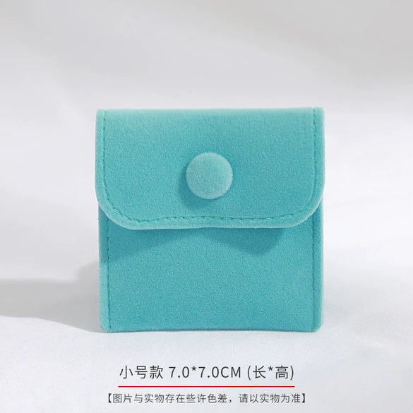 Wholesale Flannel And Velvet Jewelry Storage Bags With Anti Oxidation Buttons And Silk Screen Printing