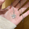 Wholesale Flower Shape Zircon Inlaid Copper Pendant Titanium Steel Oshaped Chain Necklace For Women Light Luxury Style