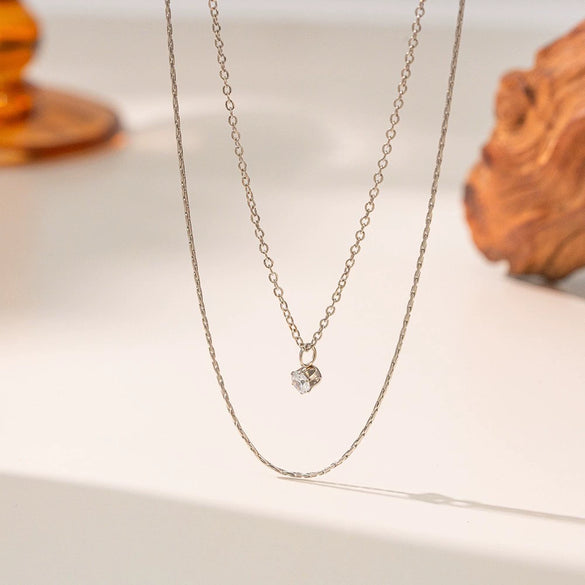 Wholesale Fourleaf Clover Rhombus Sweet And Cool Geometric Style Electroplated 18K Gold Steel Sweater Chain Jewelry For Women