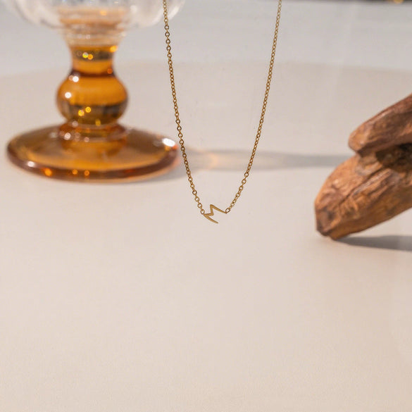 Wholesale Fourleaf Clover Rhombus Sweet And Cool Geometric Style Electroplated 18K Gold Steel Sweater Chain Jewelry For Women