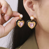 Wholesale French Retro Earrings With Imitation Pearl And Heart Shaped Three Dimensional Glass Stone Copper Material Electroplating Design