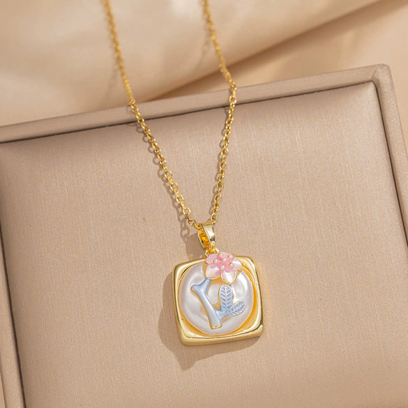 Wholesale French Retro Oil Drop Baroque Freshwater Pearl Light Luxury Enamel Painted Flower Pendant In Titanium Steel With Electroplated Copper Pendant