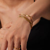 Wholesale French Retro Women's Titanium Steel Geometric Three Layer Snake Bone Bracelet With 18K Gold Electroplating