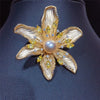 Wholesale Fresh Water Pearl And Copper Brooch With Matte Gold Plated Fashionable Flower Design For Women