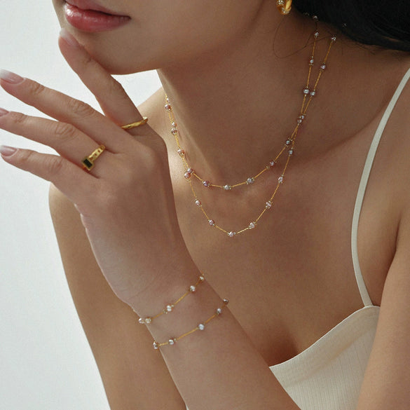 Wholesale Freshwater Pearl And Titanium Steel Electroplated Jewelry Set For Women Ferris Wheel Design Necklace And Bracelet