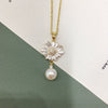 Wholesale Freshwater Pearl Pendant Earrings With Sunflower Design